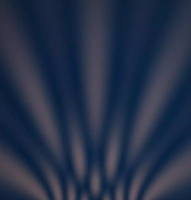 Abstract wave pattern in warm orange on dark blue